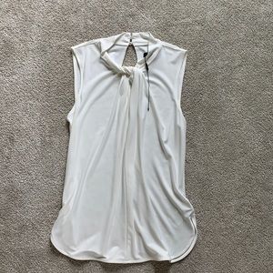 High neck blouse with tie knot detail